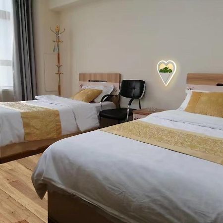 Xinming Fashion Hotel يانجي المظهر الخارجي الصورة