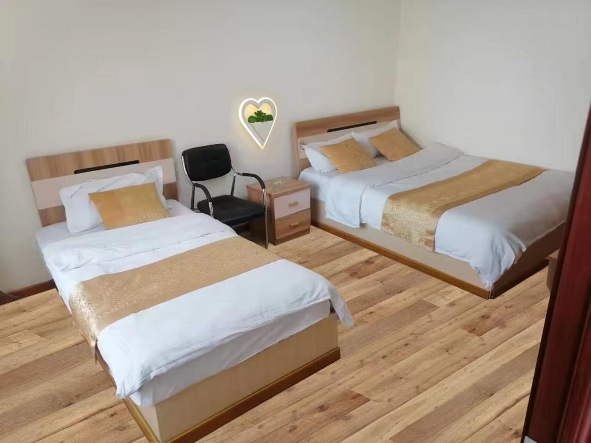 Xinming Fashion Hotel يانجي المظهر الخارجي الصورة