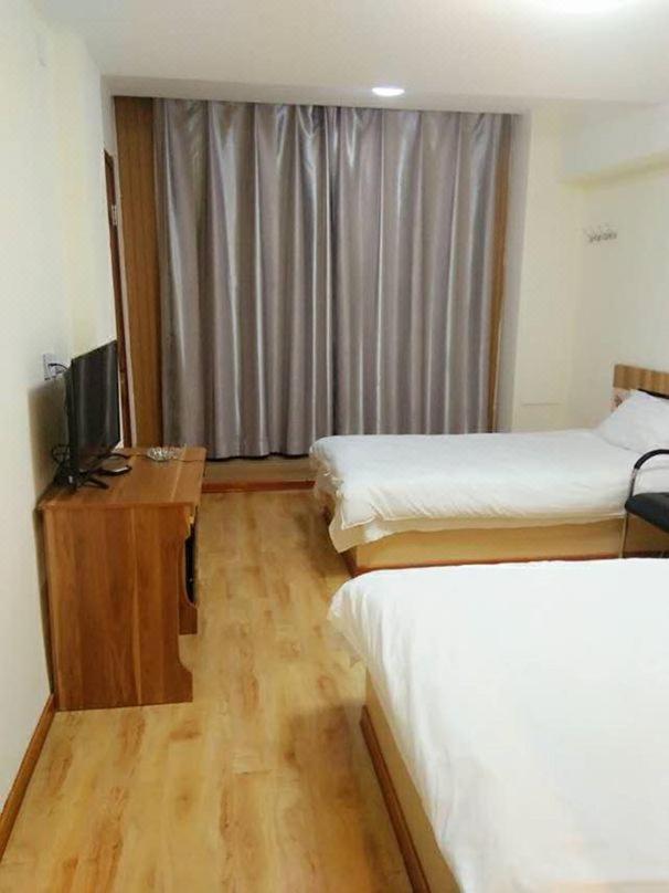 Xinming Fashion Hotel يانجي المظهر الخارجي الصورة
