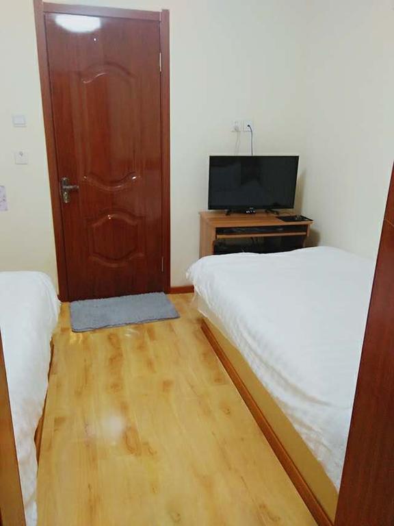 Xinming Fashion Hotel يانجي المظهر الخارجي الصورة